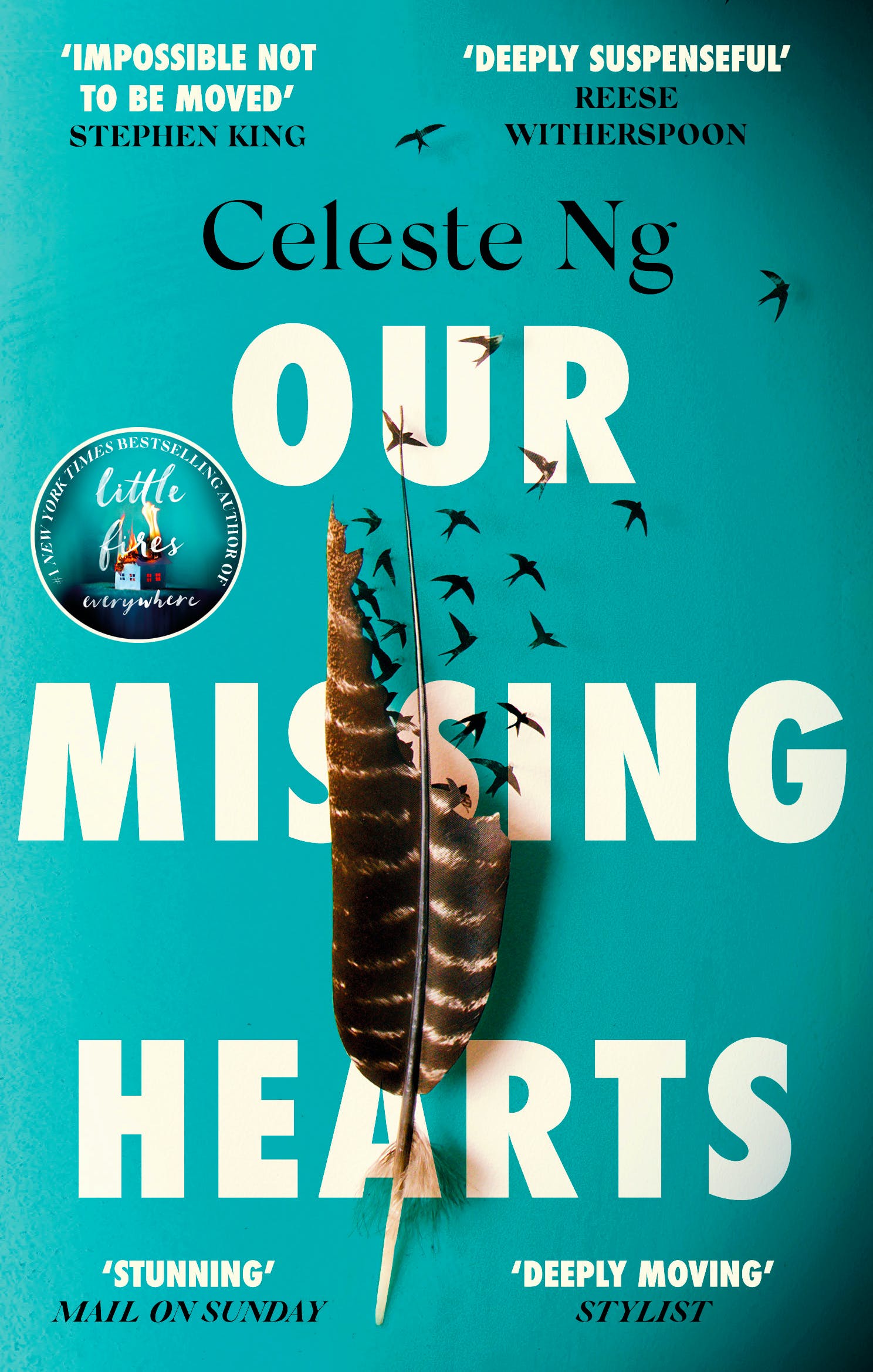 a turquoise book cover with a feather