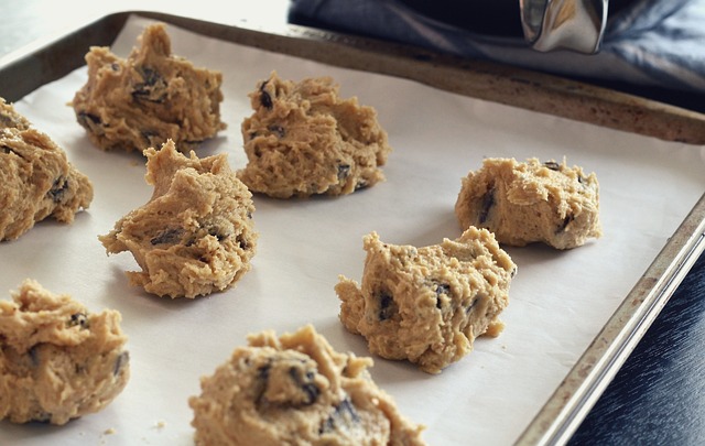 raw chocolate chip cookie dough on a sheet pan