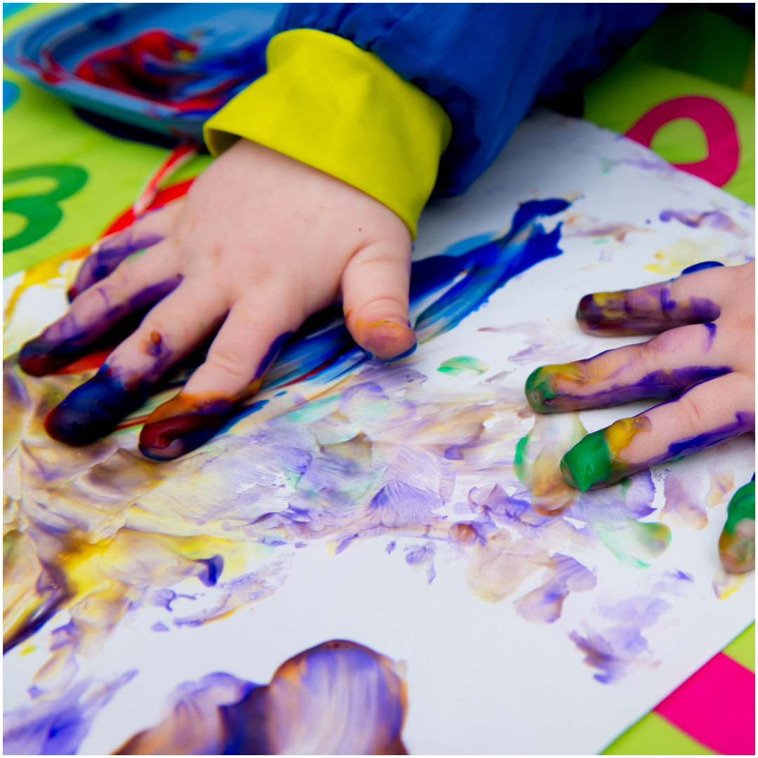 child hands painting